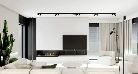 Wnętrze salonu w stylu minimalistycznym i skandynawskim z jasnymi meblami.