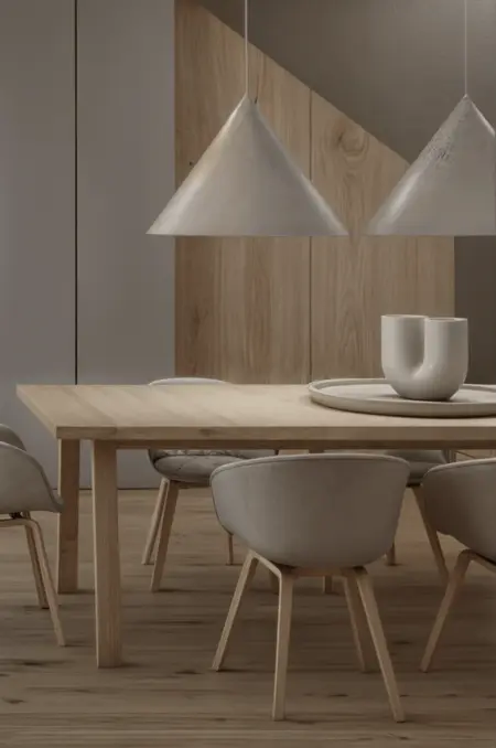 Wnętrze jadalni z drewnianym stołem, minimalistycznymi lampami i eklektycznymi akcentami.