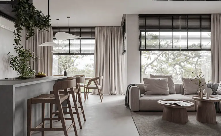 Wnętrze w stylu japandi i minimalistycznym z jasnymi meblami i drewnianymi detalami.