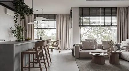 Wnętrze w stylu japandi i minimalistycznym z jasnymi meblami i drewnianymi detalami.