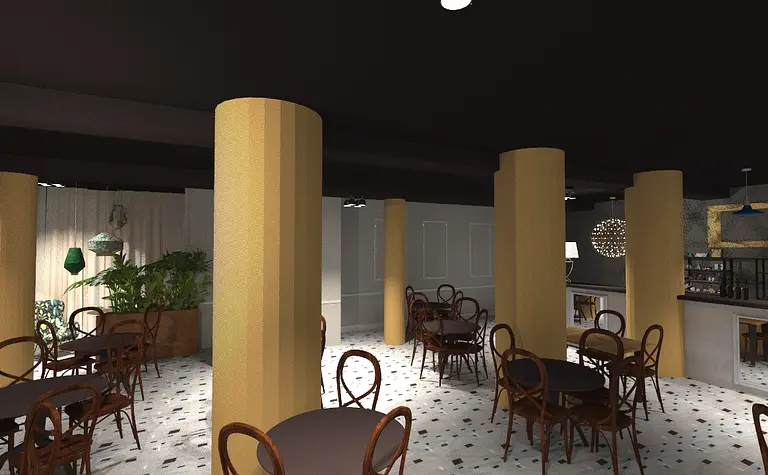 Wnętrze kawiarni z żółtymi filarami, drewnianymi stołami i eklektycznymi lampami.