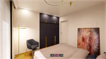 Wnętrze sypialni z szafą art deco, szarym fotelem i obrazem.