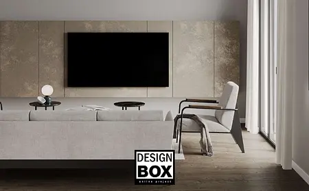 Wnętrze salonu w stylu minimalistycznym z szarym kanapą i drewnianymi detalami.
