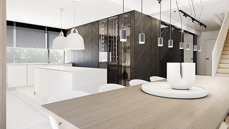 Wnętrze kuchni w stylu minimalistycznym z białymi meblami i czarnymi detalami.