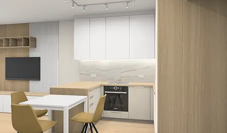 Wnętrze współczesnej kuchni z białymi meblami i drewnianymi detalami.