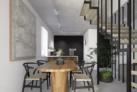 Jadalnia w stylu industrialnym i minimalistycznym z drewnianym stołem i czarnymi detalami.