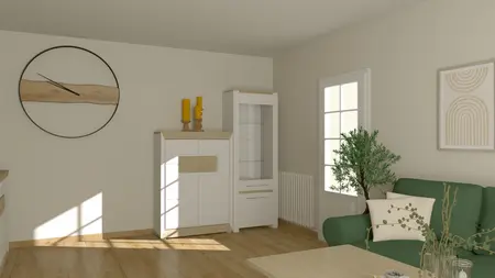 Wnętrze nowoczesnego salonu z zieloną kanapą, białymi meblami i naturalnymi akcentami.