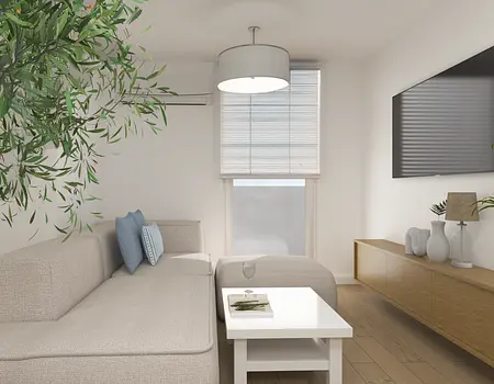 Wnętrze salonu w stylu boho z jasną sofą i drewnianymi meblami.