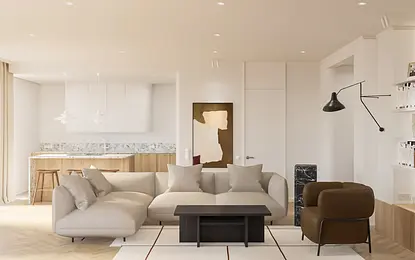 Wnętrze salonu z beżową sofą, drewnianym stołem oraz nowoczesnymi akcentami.