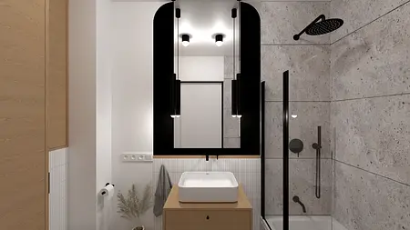 Wnętrze łazienki w stylu industrialnym i skandynawskim z drewnianą szafką i nowoczesnymi lampami.