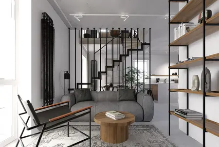 Wnętrze salonu z szarymi meblami, drewnianymi akcentami, styl industrialny i minimalistyczny.