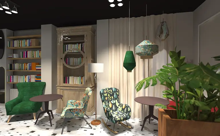 Eklektyczne wnętrze z zielonymi fotelami, regałem z książkami i roślinami.
