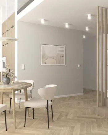 Wnętrze jadalni w stylu japandi i minimalistycznym z drewnianym stołem i jasnymi krzesłami.
