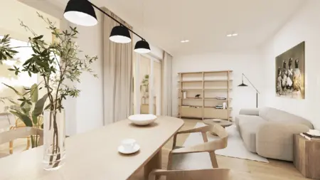 Wnętrze salonu w stylu japandi i minimalistycznym z jasnymi meblami i roślinami.