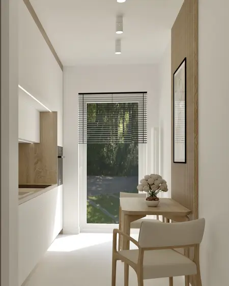 Wnętrze kuchni w stylach boho, japandi i minimalistycznym z drewnianymi elementami.