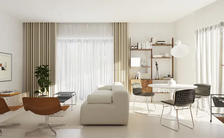 Wnętrze salonu w stylu nowoczesnym, soft minimalizm i vintage z białą sofą i drewnianymi detalami.