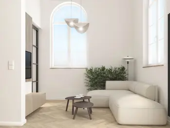 Wnętrze salonu w stylu japandi i minimalistycznym z jasnymi meblami.