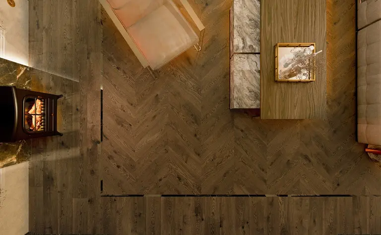 Wnętrze salonu w stylu art deco i glamour z drewnianą podłogą i kominkiem.