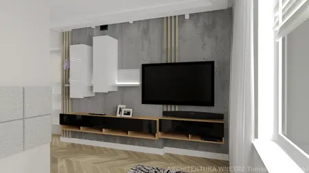Nowoczesny salon z telewizorem, białymi meblami i drewnianą podłogą.