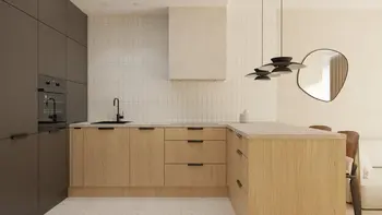 Kuchnia w stylu japandi, minimalistycznym i współczesnym z drewnianymi meblami.
