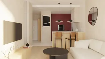 Wnętrze kuchni w stylu japandi, minimalistycznym i współczesnym z drewnianymi detalami.