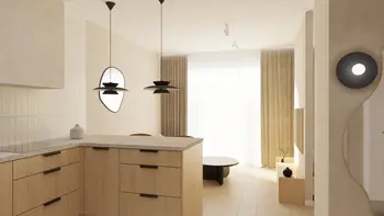 Wnętrze kuchni w stylu japandi, minimalistycznym i współczesnym z drewnianymi meblami.