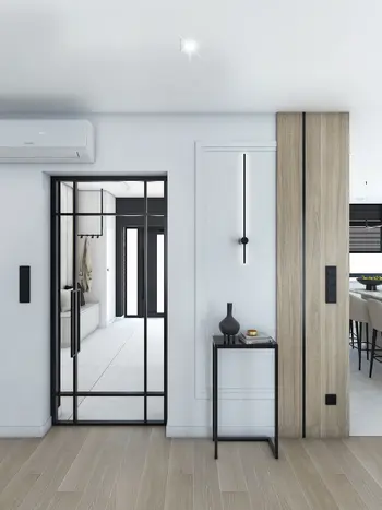 Minimalistyczne wnętrze w stylu japandi z przeszklonymi drzwiami i drewnianymi detalami.