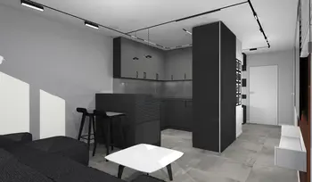 Wnętrze kuchni w stylu minimalistycznym z szarymi meblami i czarnymi akcentami.