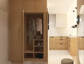 Wnętrze garderoby w stylu japandi, minimalistycznym i współczesnym z drewnianymi meblami.