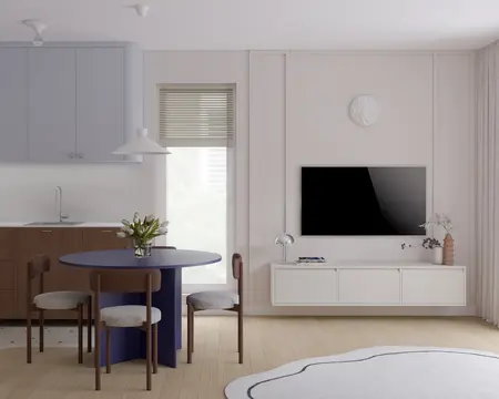 Wnętrze kuchni w stylu japandi z minimalistycznym stołem i nowoczesnymi akcentami.