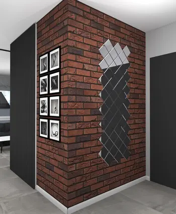 Korytarz z ceglanym murem, lustrami i zdjęciami w stylu art deco, industrialnym i minimalistycznym.