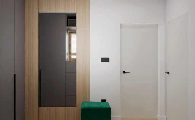 Przedpokój w stylu minimalistycznym z szafą i zielonym siedziskiem.