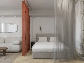 Wnętrze sypialni z elementami art deco i tradycyjnymi meblami.