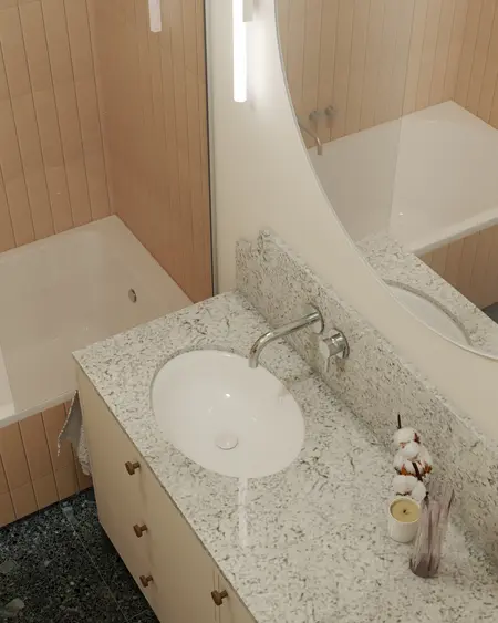 Wnętrze łazienki z wanną, minimalistycznym blatem i skandynawskim designem