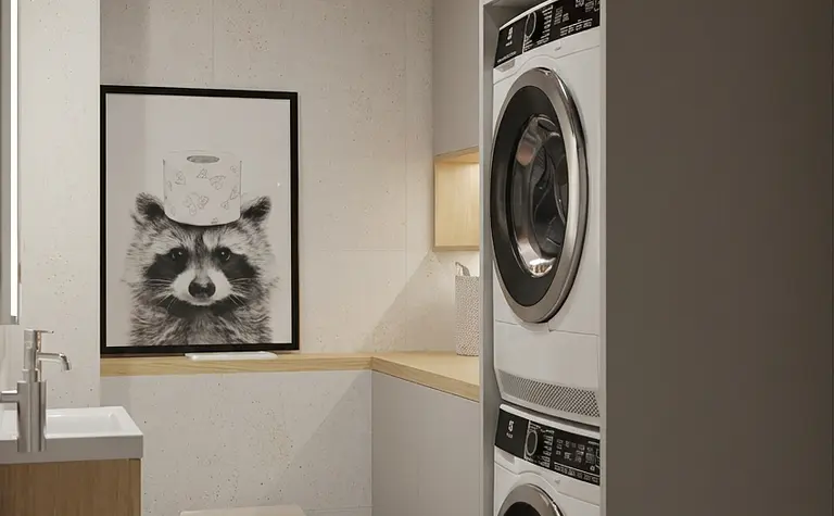 Wnętrze łazienki z pralką, umywalką i dekoracyjnymi płytkami w stylu boho i nowoczesnym.