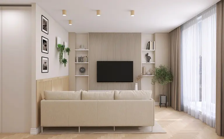 Salon w stylu skandynawskim z beżową sofą i drewnianymi elementami.