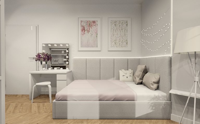 Sypialnia w stylu boho i minimalistycznym z szarym łóżkiem i toaletką.