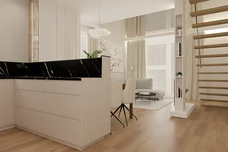 Wnętrze kuchni z białymi meblami i czarnym blatem, styl glamour.