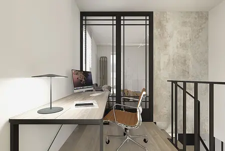 Gabinet w stylu industrialnym i minimalistycznym z biurkiem, lampą i szklanymi drzwiami.