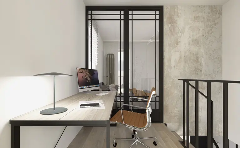 Gabinet w stylu industrialnym i minimalistycznym z biurkiem, lampą i szklanymi drzwiami.