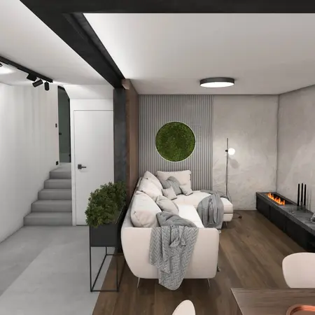 Wnętrze salonu w stylu minimalistycznym, z białą sofą, drewnianymi detalami i roślinnością.