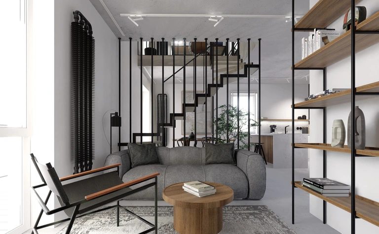 Wnętrze salonu z szarymi meblami, drewnianymi akcentami, styl industrialny i minimalistyczny.