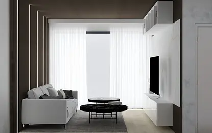 Minimalistyczny i nowoczesny salon z białą sofą oraz czarnym stolikiem kawowym.