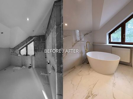 Nowoczesna łazienka z białą wanną i marmurowymi akcentami, styl glamour