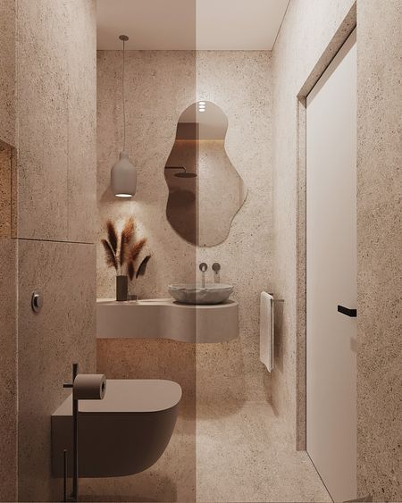 Minimalistyczna łazienka w stylu japandi z beżowymi ścianami i nowoczesnym lustrem.