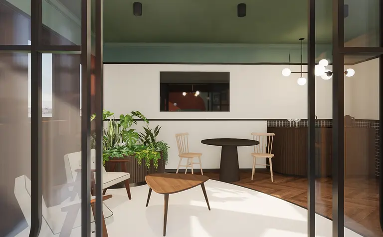 Wnętrze w stylu eklektycznym z roślinami i meblami art deco.