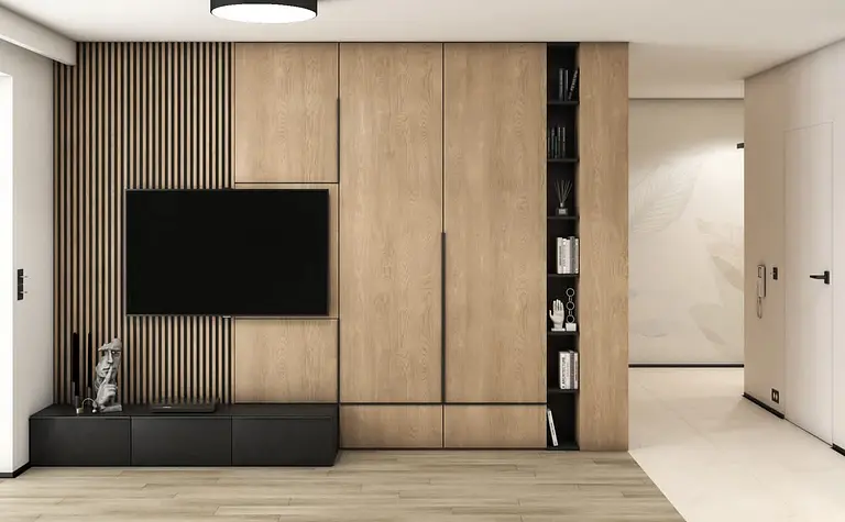 Nowoczesne wnętrze salonu z drewnianą szafą, telewizorem i minimalistycznym wystrojem.