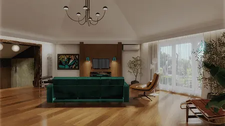 Wnętrze salonu w stylu art deco z zieloną sofą i roślinami.