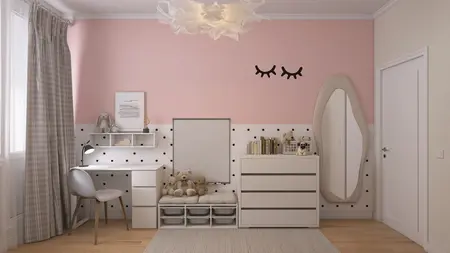 Pokój dla dzieci z różową ścianą, białymi meblami i zabawkami.