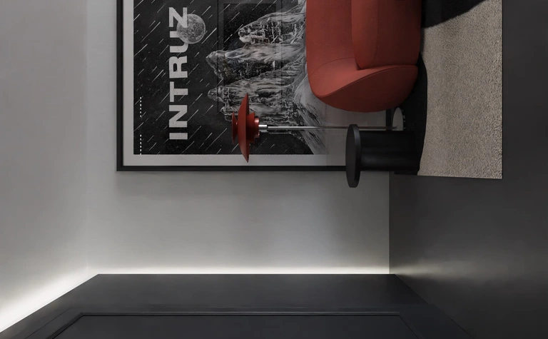 Nowoczesny salon z czerwoną sofą, czarnym stołem i grafiką na ścianie.